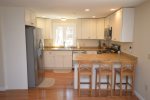 Full Kitchen with peninsula and seating for three